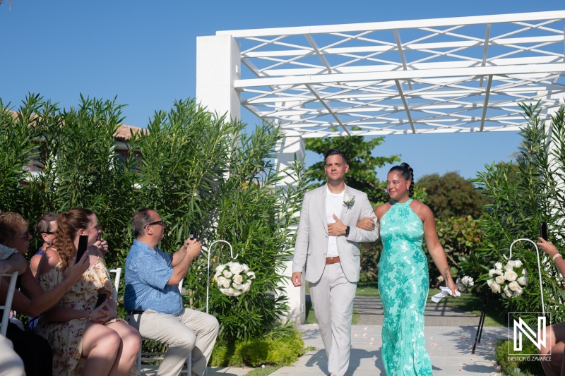 Groom walking down the aisle