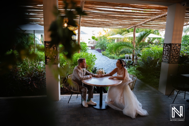 Romantic wedding celebration in Curacao with a couple enjoying an intimate moment at a tropical venue