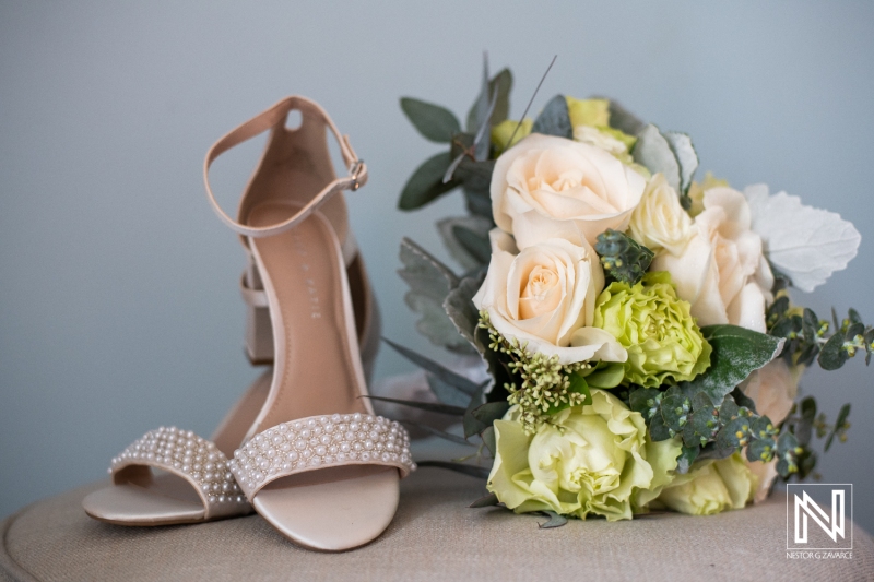 Bridal shoes and bouquet