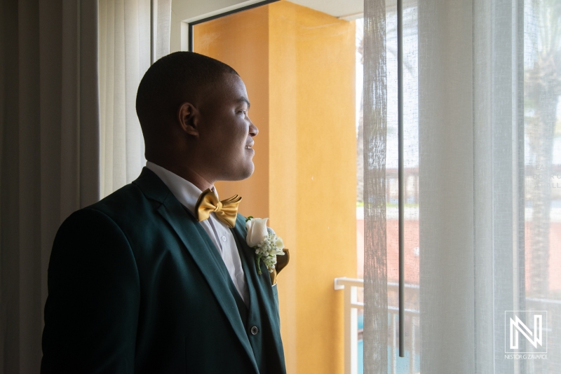 Groom looking out the window